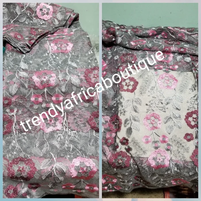 Gray/pink Embridery tulle Africa French lace fabric. Beautiful flower design great texture for making Nigerian/African party dress. Sold per 5yds. Price is for 5yds. Aso-ebi lace. Contact for large quantity Tunics Brand named Gray/pink Embridery tulle Africa French lace fabric. Beautiful flower design great texture for making Nigerian/African party dress. Sold per 5yds. Price is for 5yds. Aso-ebi lace. Contact for large quantity Tunics Brand named