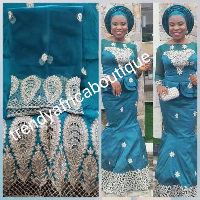 Teal green Embriodery Nigerian wedding George fabric and net blouse. Come 5yds +1.8yds wrapper. New arrival aso-ebi Silk George. Sold as a set. Small-George for Nigerian party dress Tunics Yoga stretchy Teal green Embriodery Nigerian wedding George fabric and net blouse. Come 5yds +1.8yds wrapper. New arrival aso-ebi Silk George. Sold as a set. Small-George for Nigerian party dress Tunics Yoga stretchy